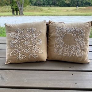 Two vintage embroidered pillows